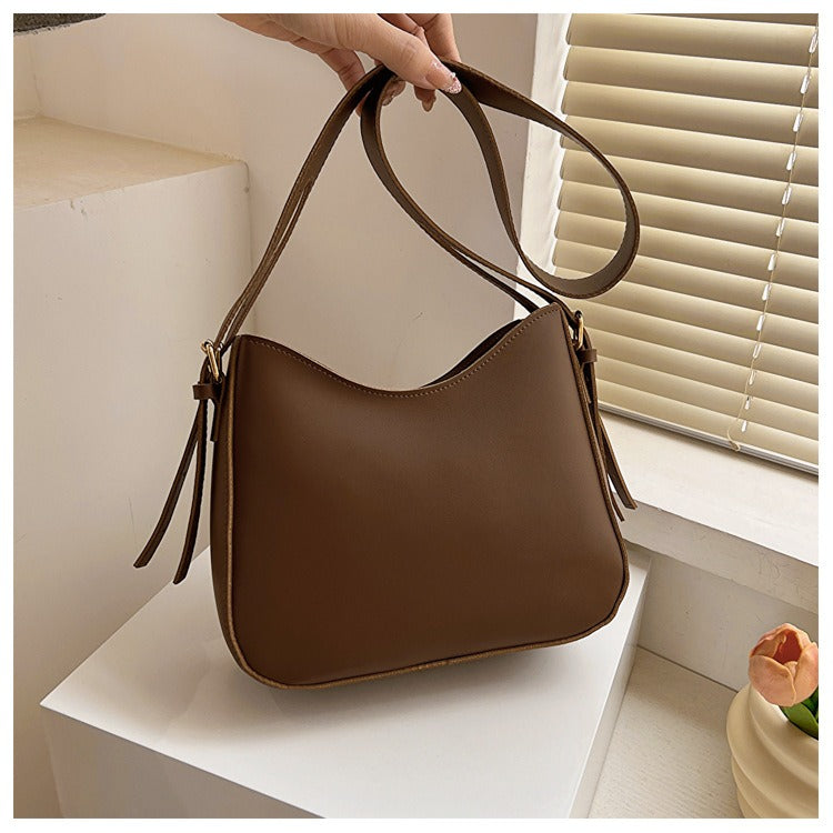 Borsa a tracolla minimalista da donna in elegante pelle vegana 0