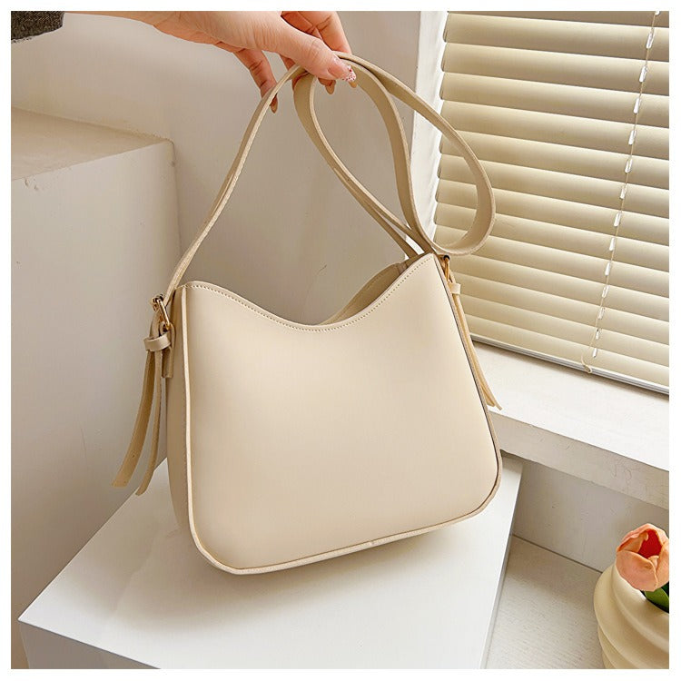 Borsa a tracolla minimalista da donna in elegante pelle vegana 1