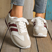 Sneakers comode con plateau e righe leggere da donna 0